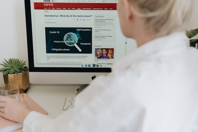 Woman looks at BBC website