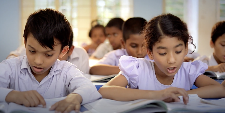 School children reading as part of Ikea PR video for CSR 