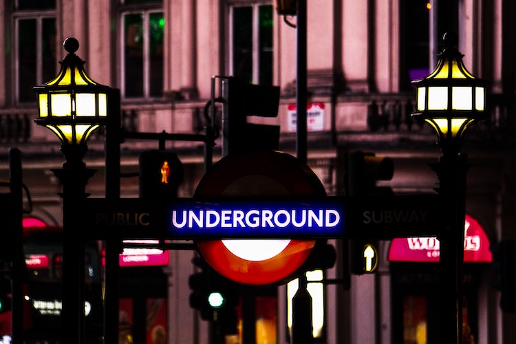 London Underground roundel at night