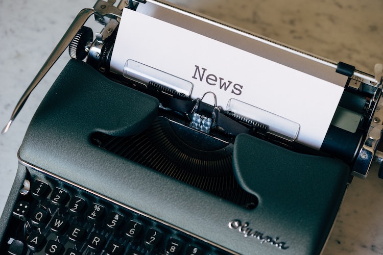 Close up of old fashioned typewriter and the word NEWS typed