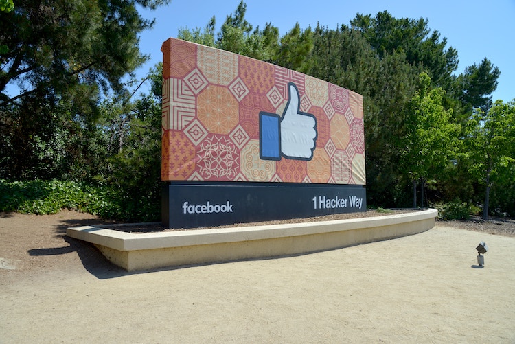 Facebook sign with thumb outside HQ